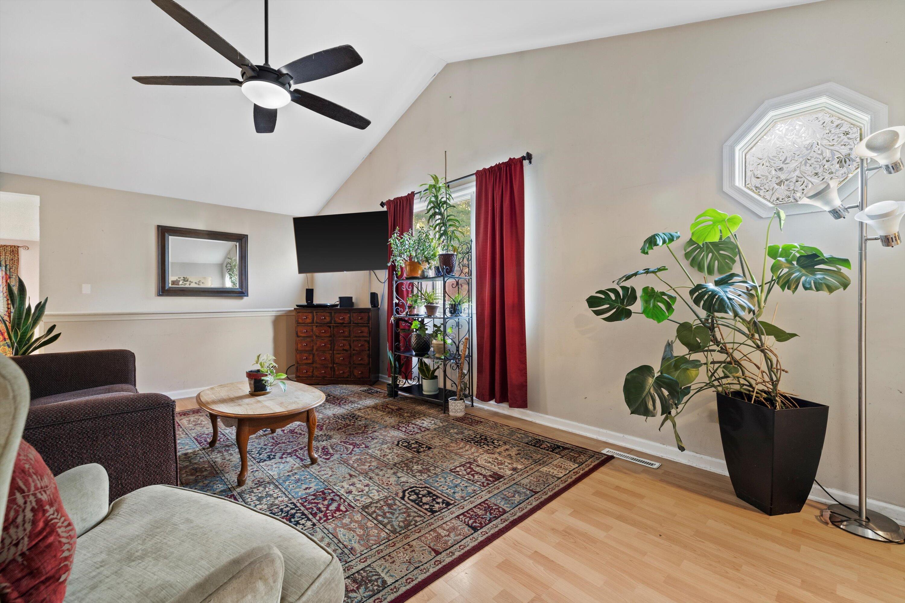 Living room w/cathedral ceiling