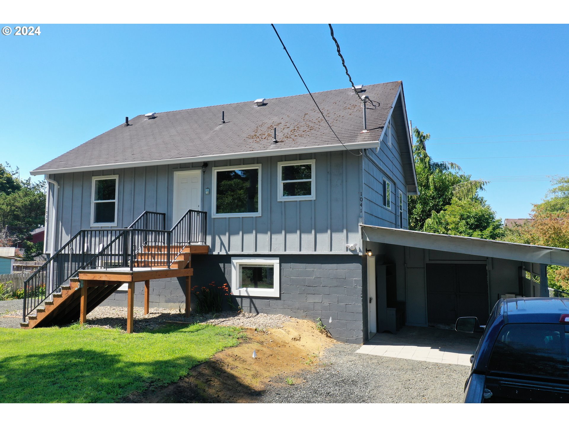 a front view of a house with patio