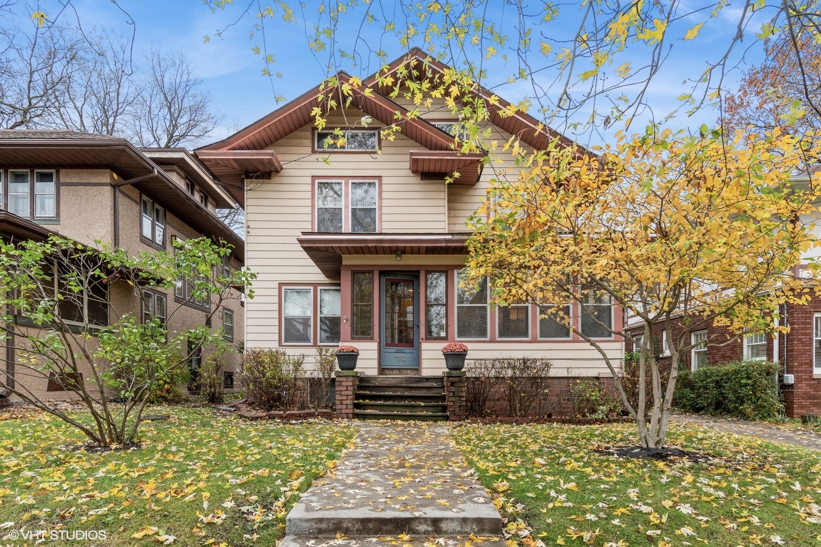 a front view of a house with garden