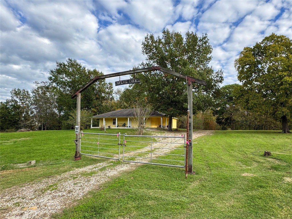 a view of a house with a big yard