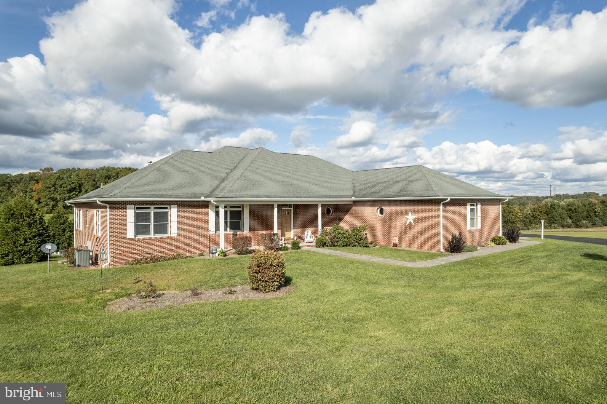 front view of house with a yard