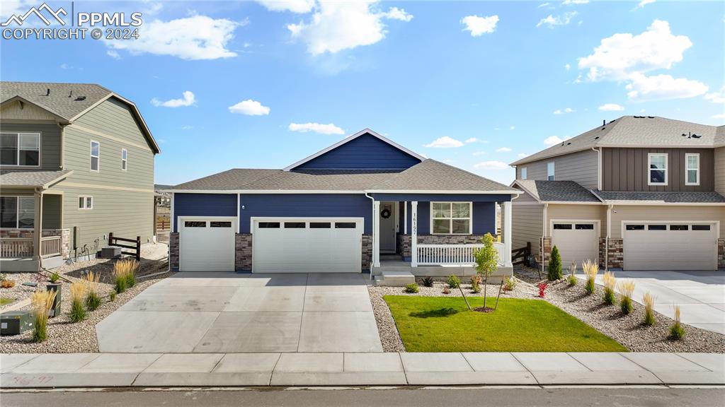 a front view of a house with yard