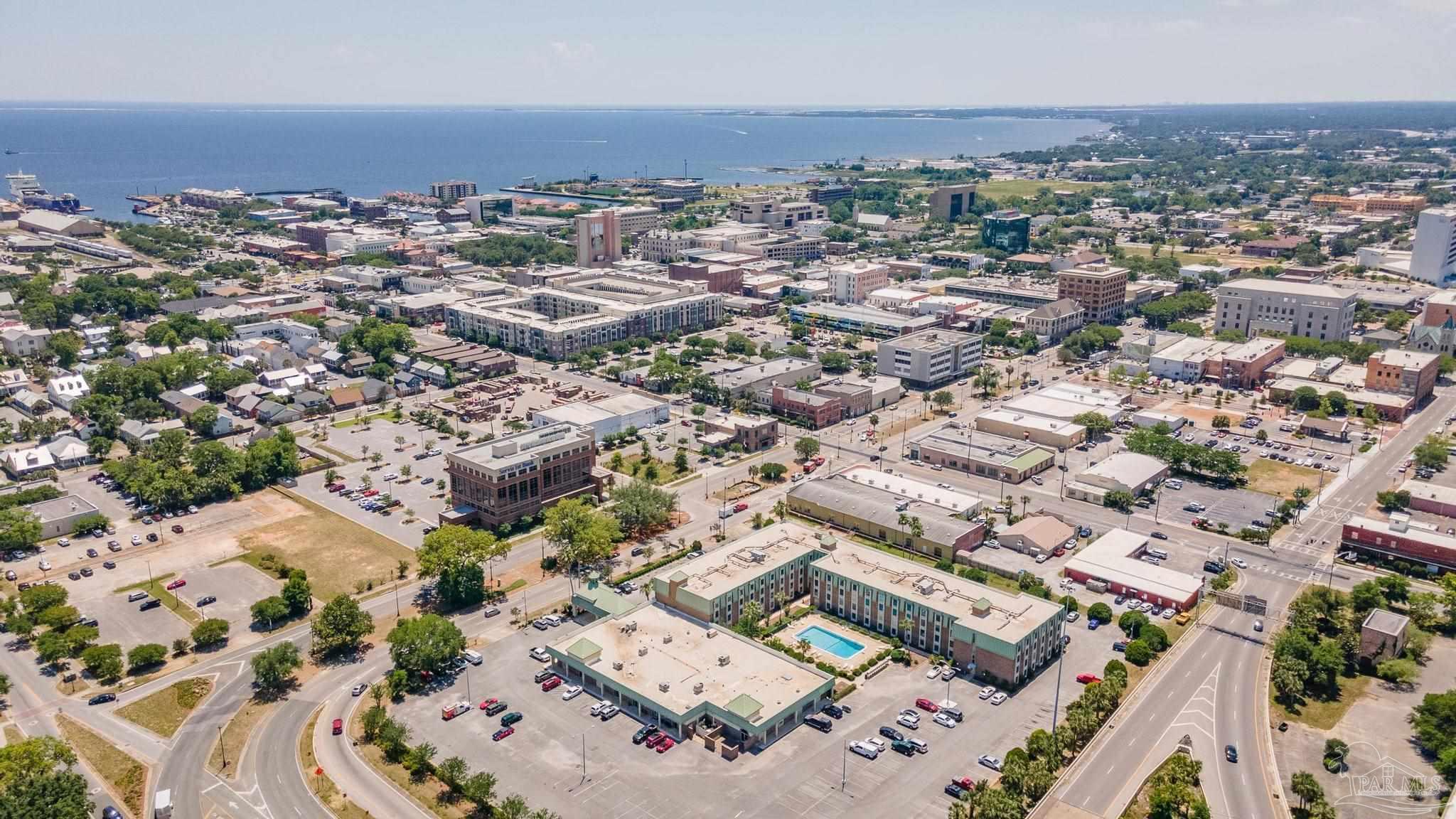 an aerial view of a city with lots of residential buildings