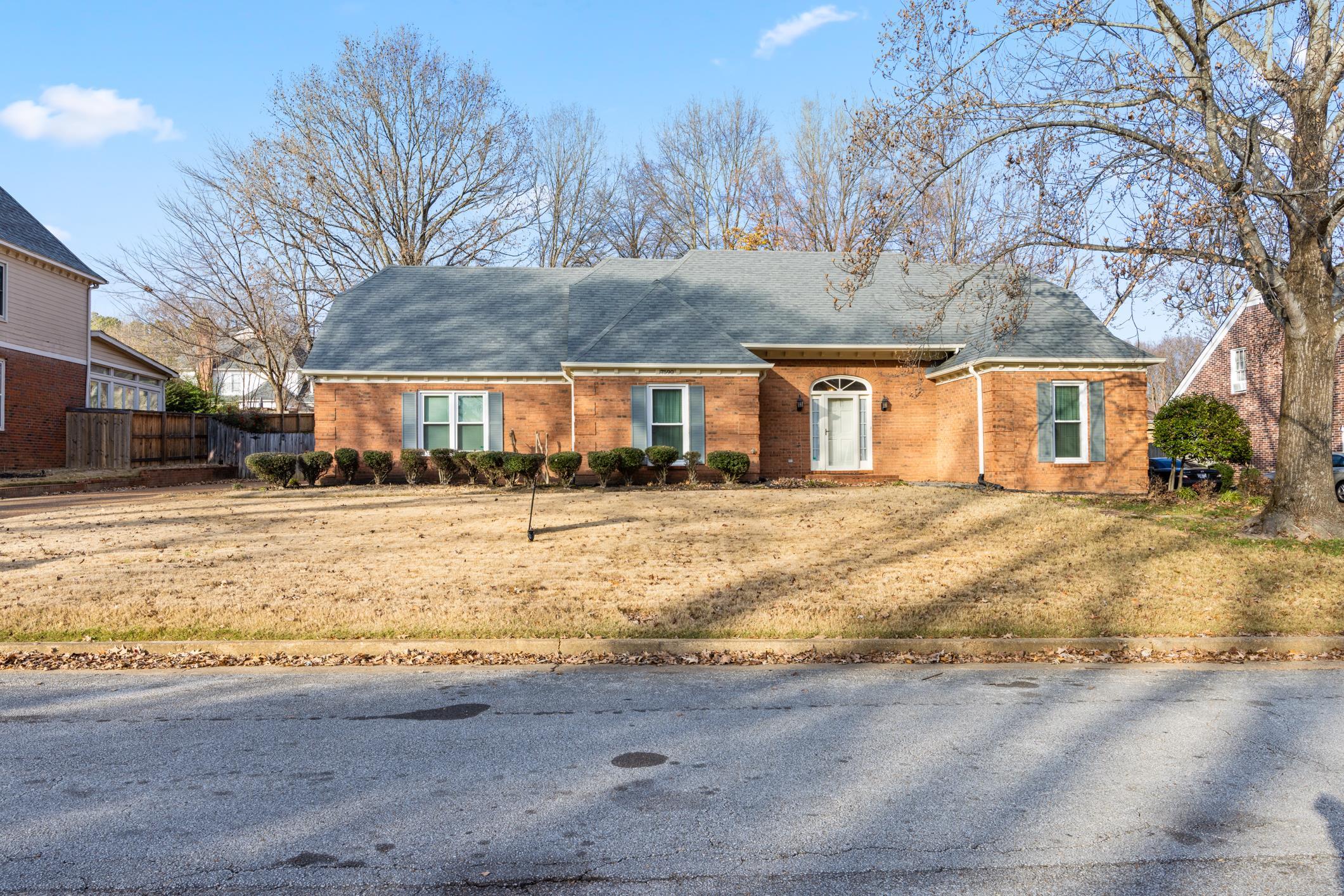 View of front of property with a front yard