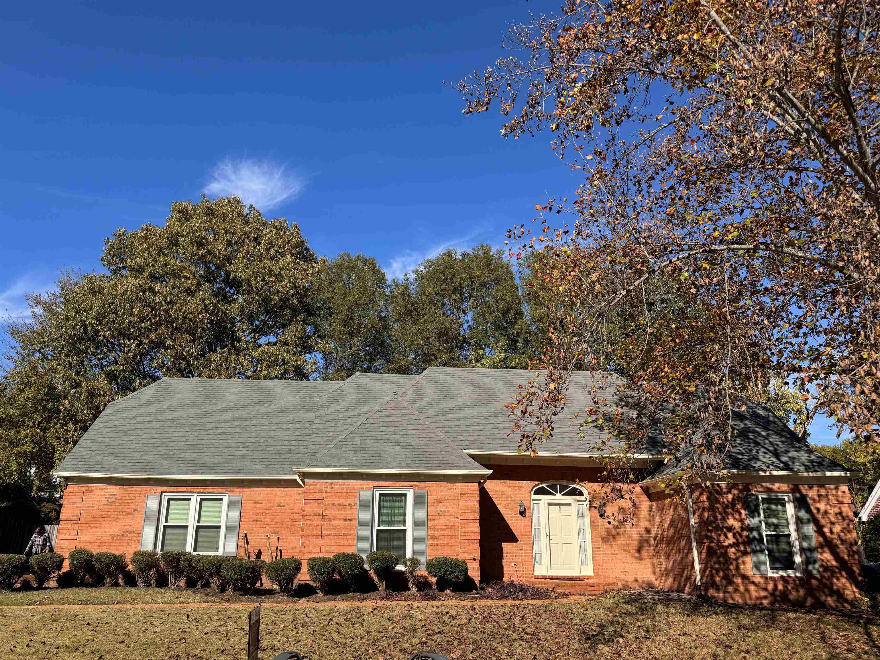 front view of a house with a yard