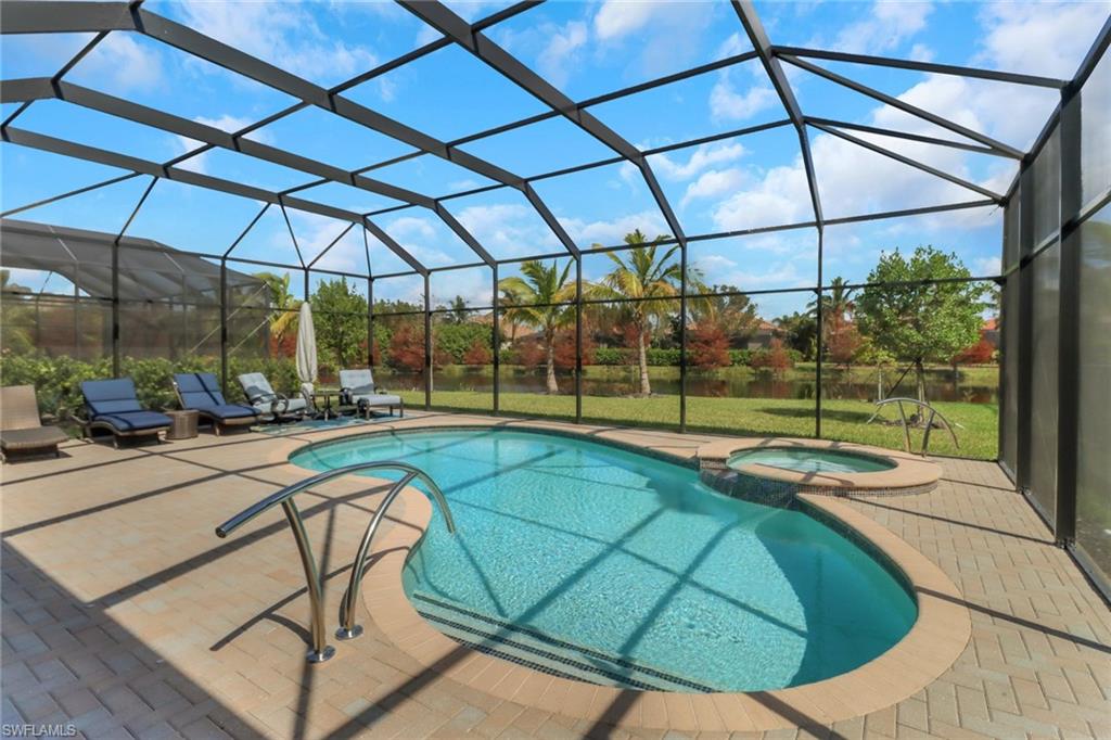 a view of a swimming pool with a patio