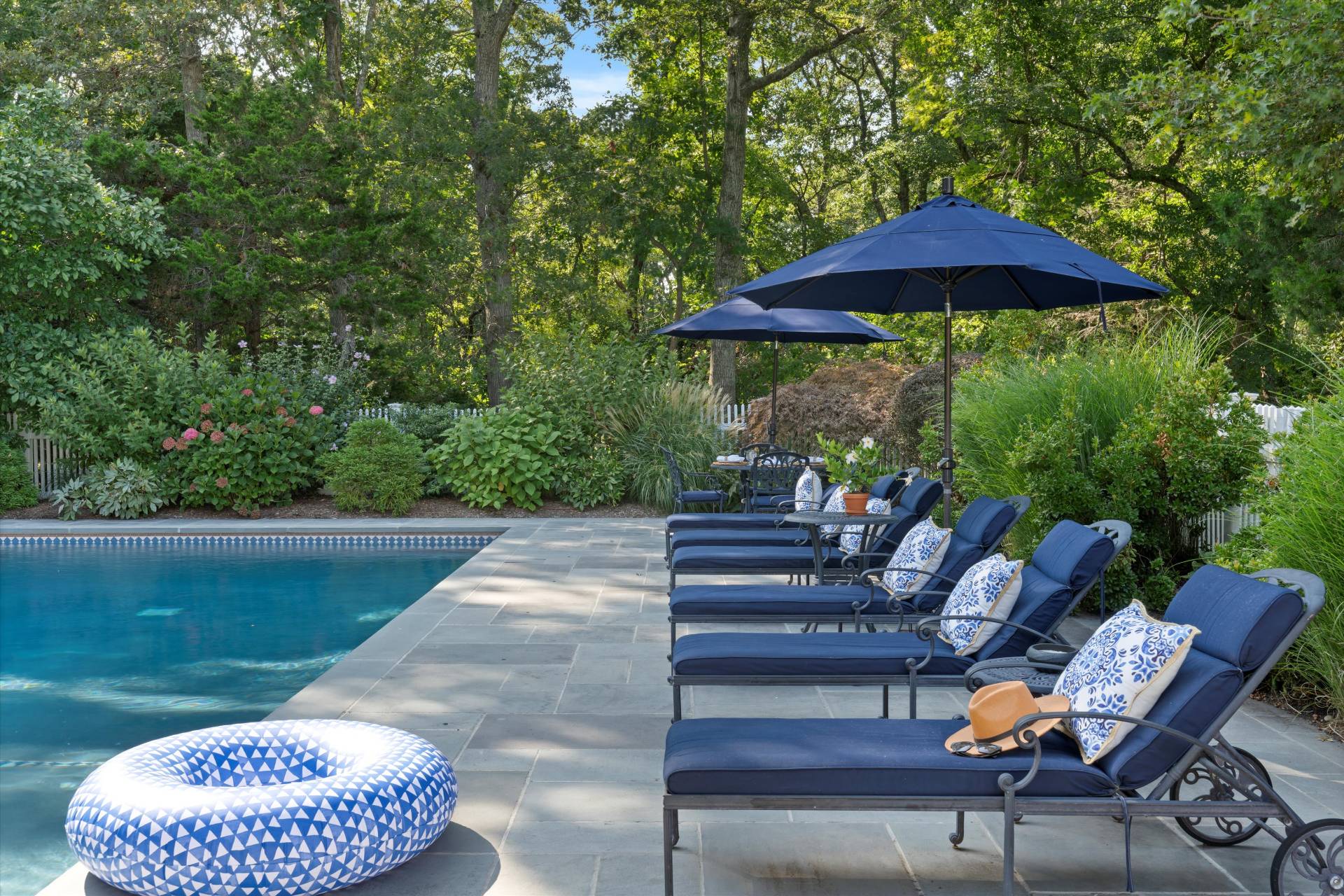 a view of a swimming pool with a patio