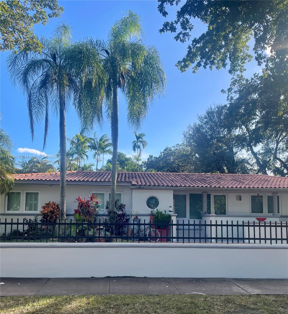 front view of a house with a street