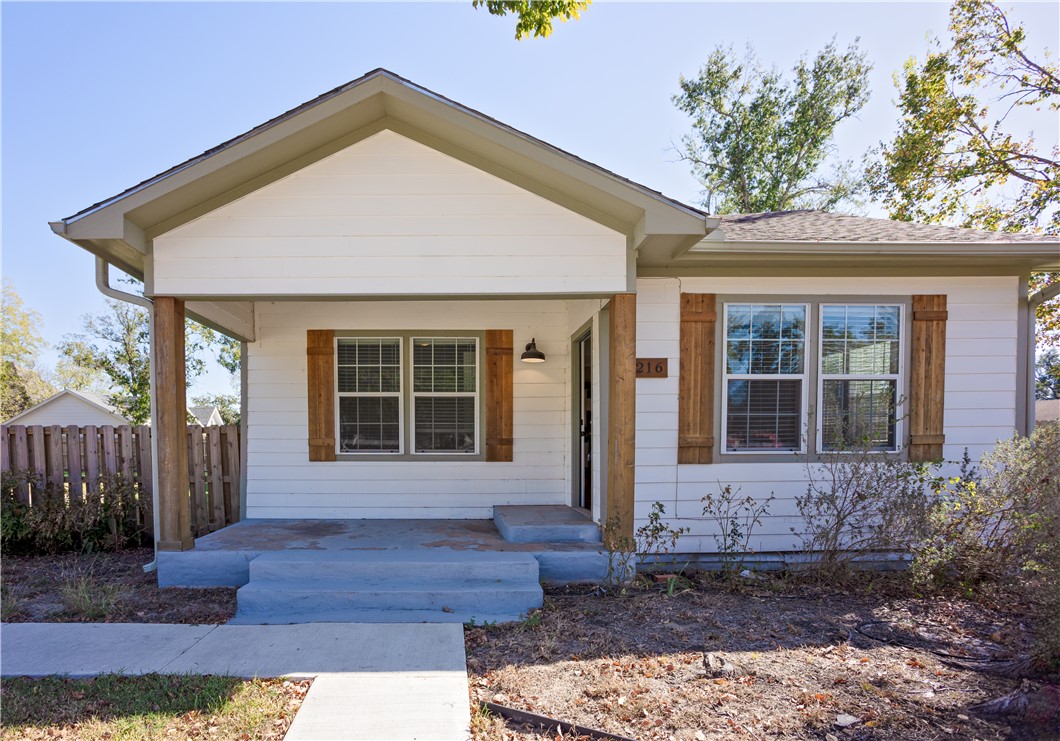 View of front of property featuring covered porch