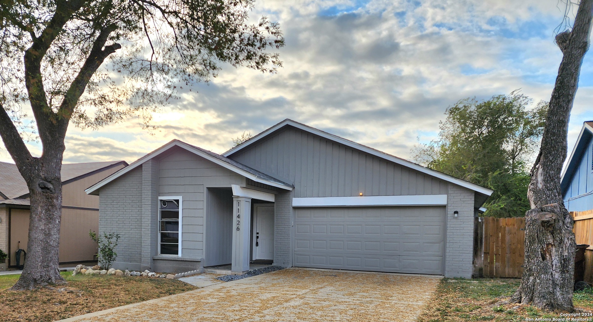 a front view of house with garage