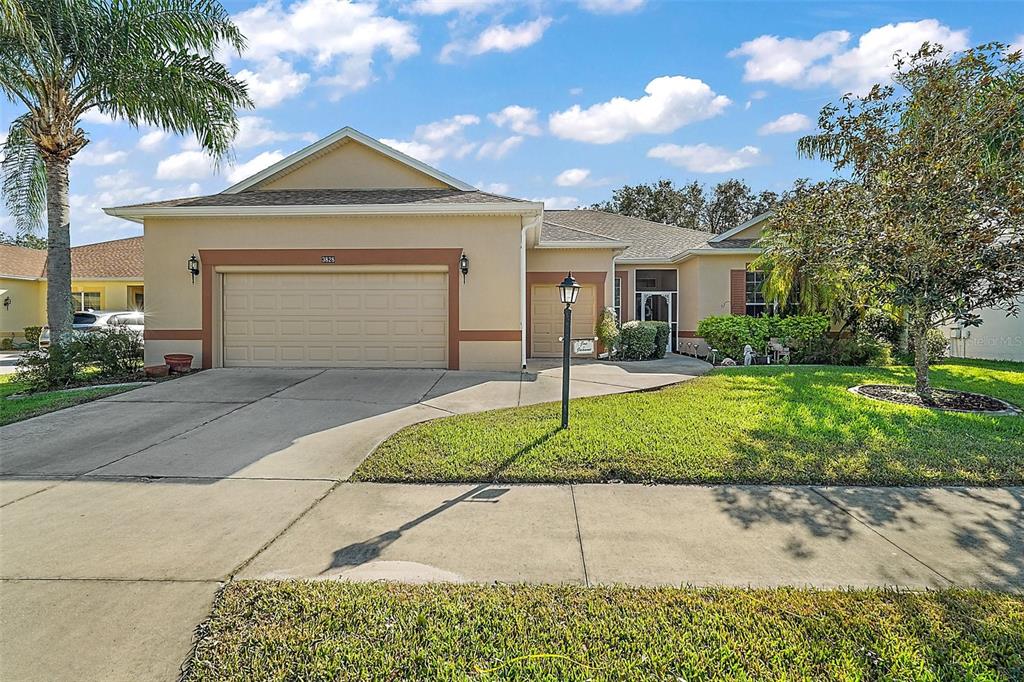 Great curb appeal. Two car garage plus golf cart port