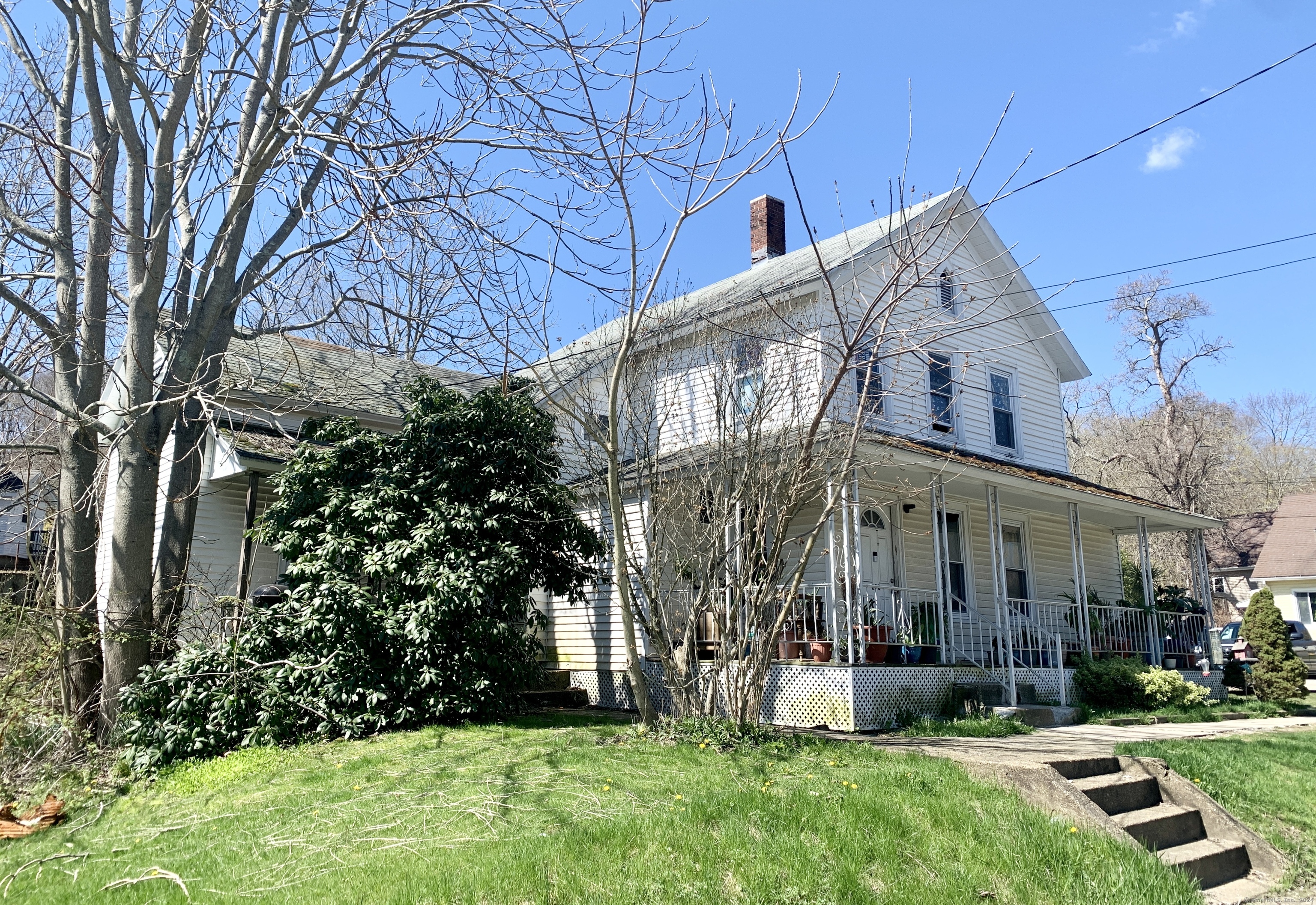 front view of a house with a yard