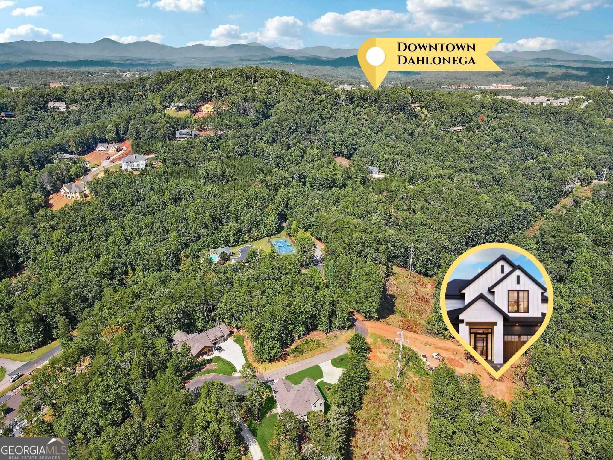 a view of a wooden house with a mountain and a sign broad