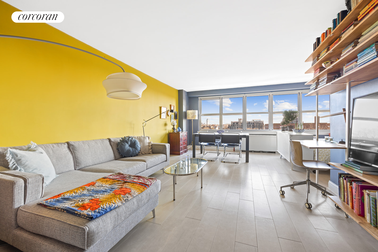 a living room with furniture and a table