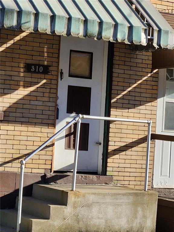 a view of a house with stairs