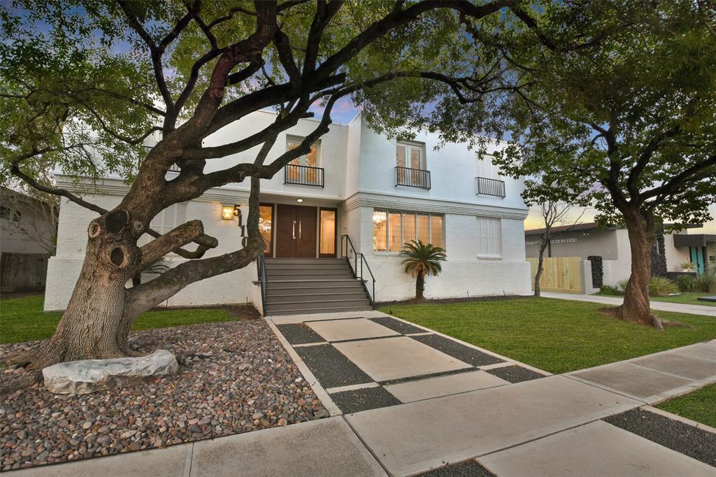 a house with trees in front of it