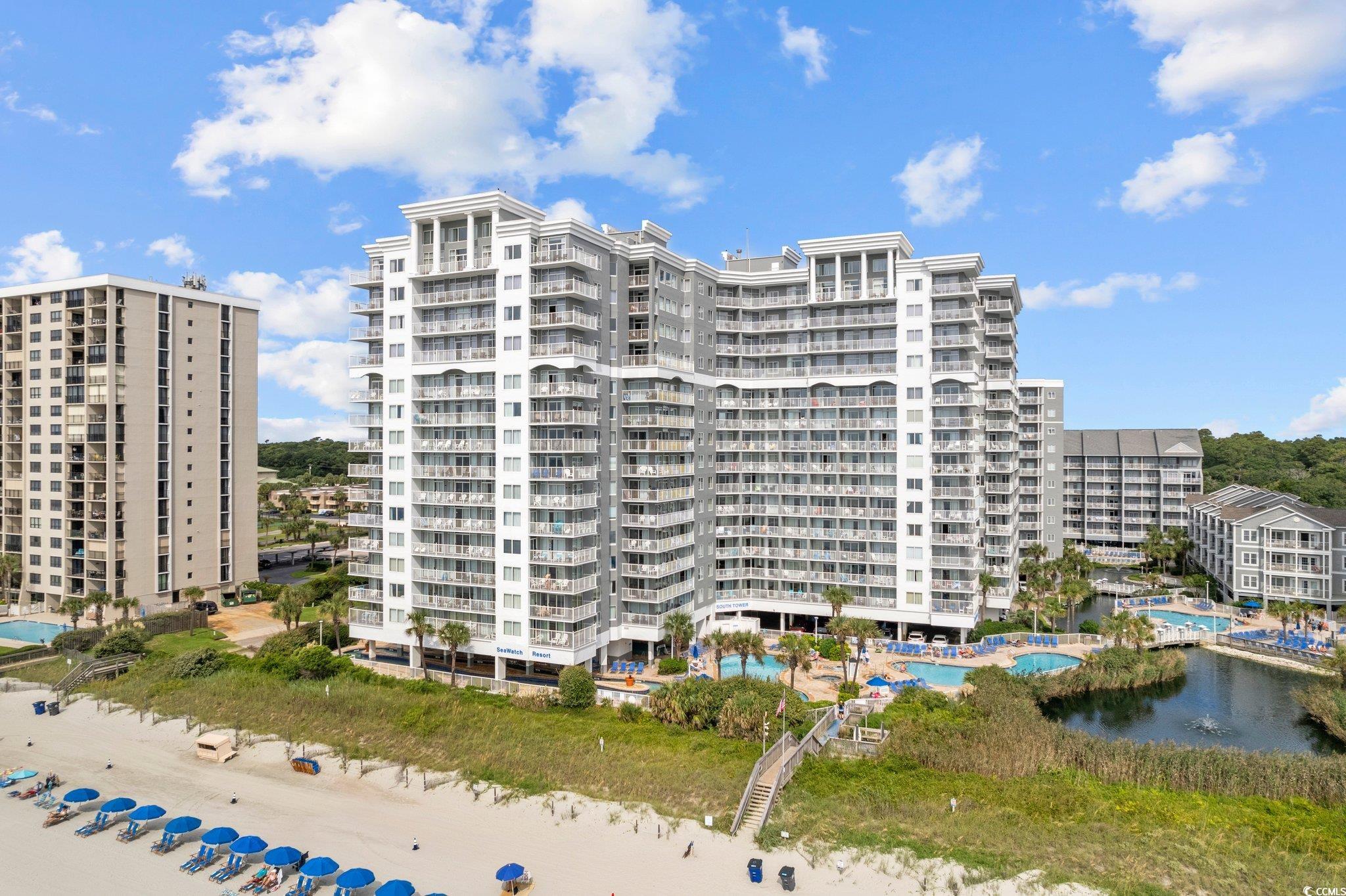 View of building exterior featuring a water view