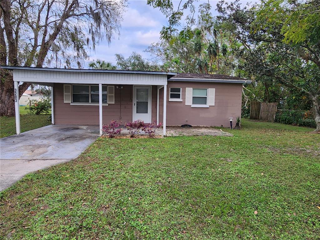 front view of a house with yard