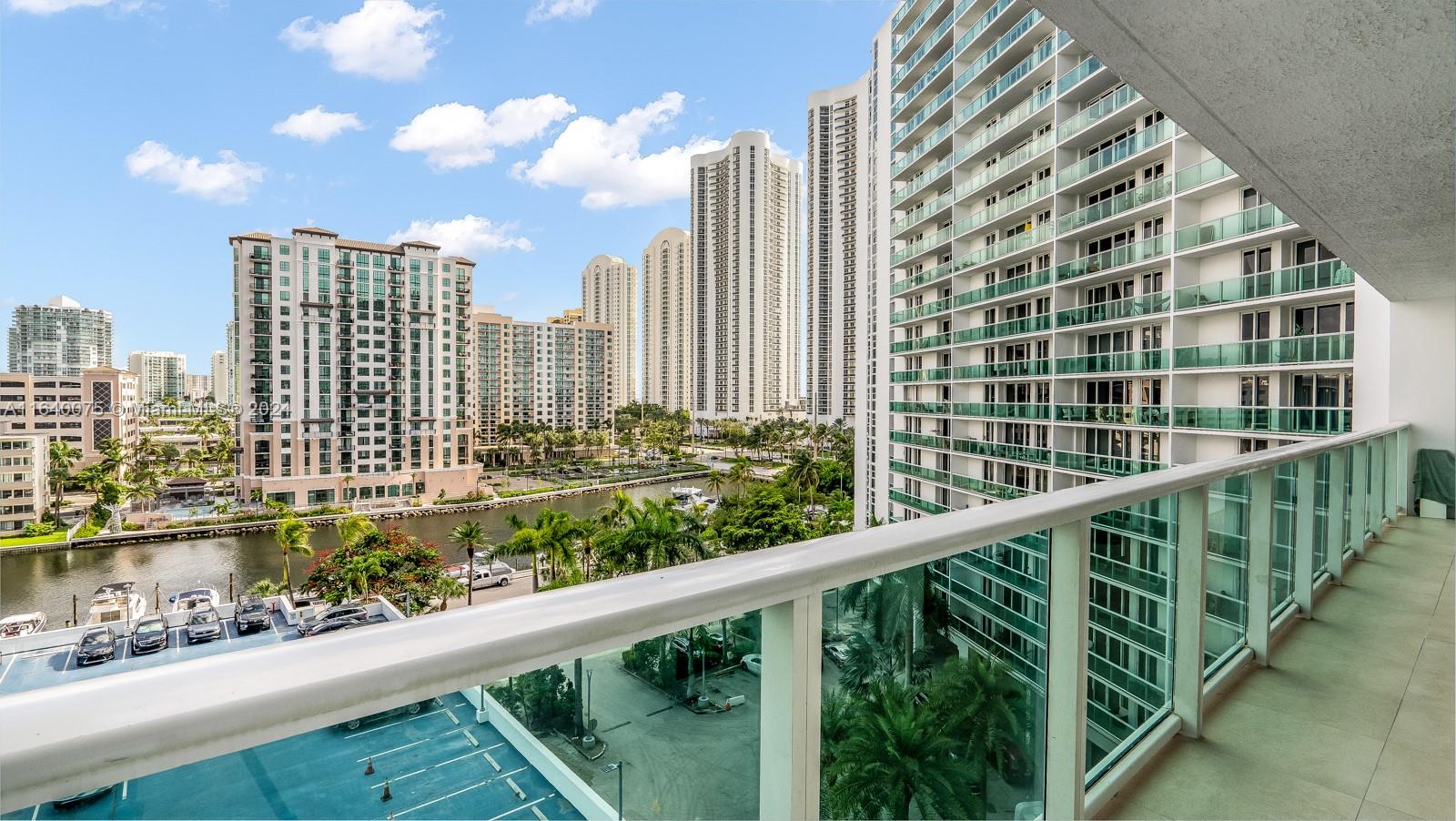 a view of a city skyline from a balcony