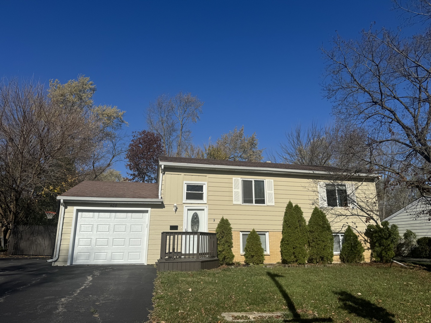 front view of a house with a yard