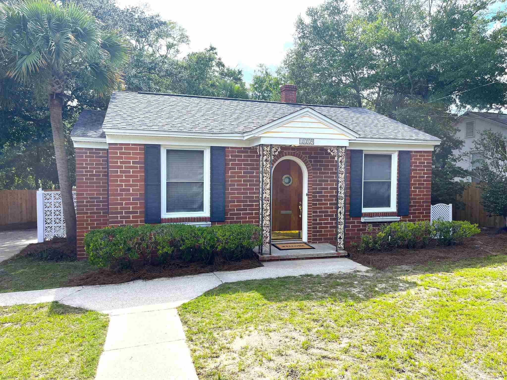 a view of a house with swimming pool