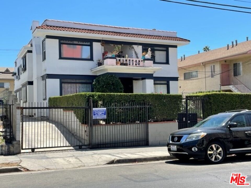 a car parked in front of a house