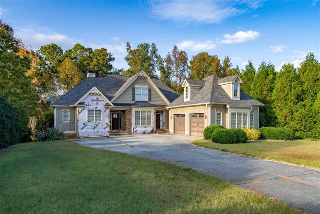 front view of a house with a yard