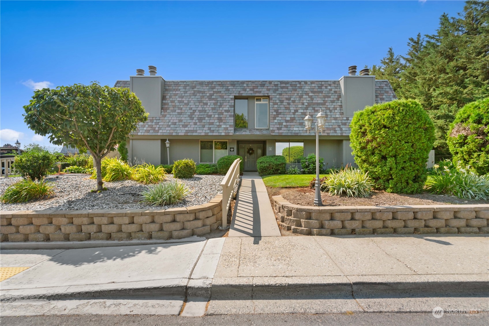 front view of a house with a small yard