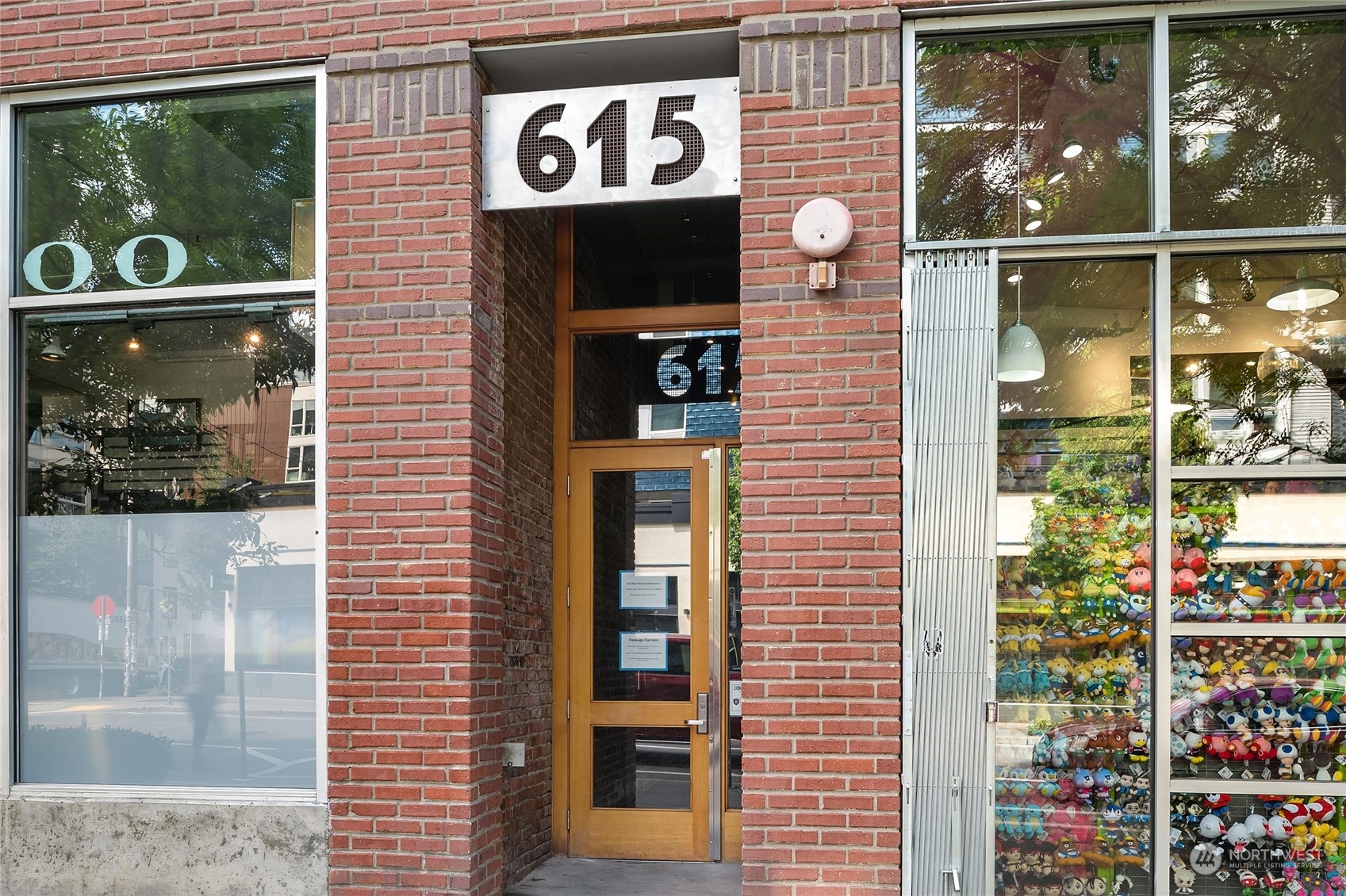 a front view of a building with a glass door