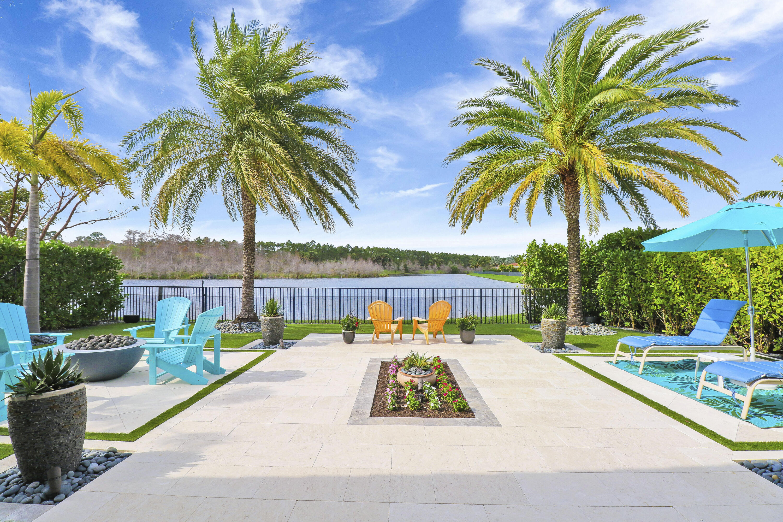 a view of a swimming pool with a lounge chairs