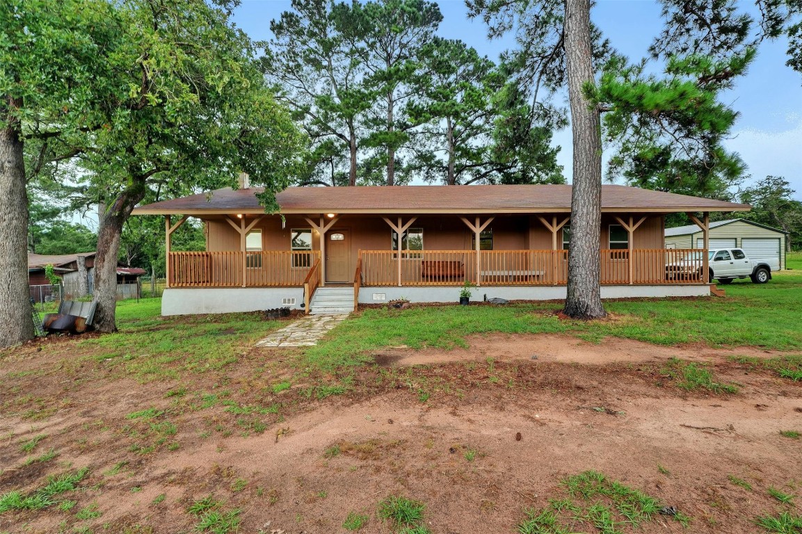 front view of a house with a tiny house