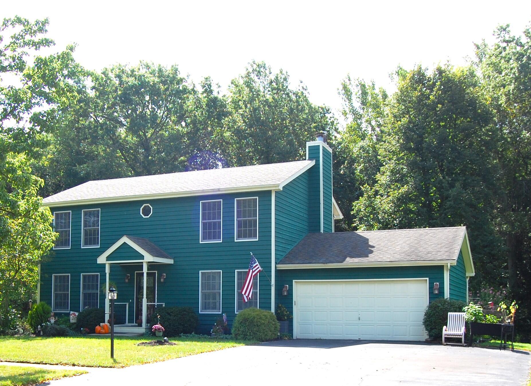 a front view of a house with a porch