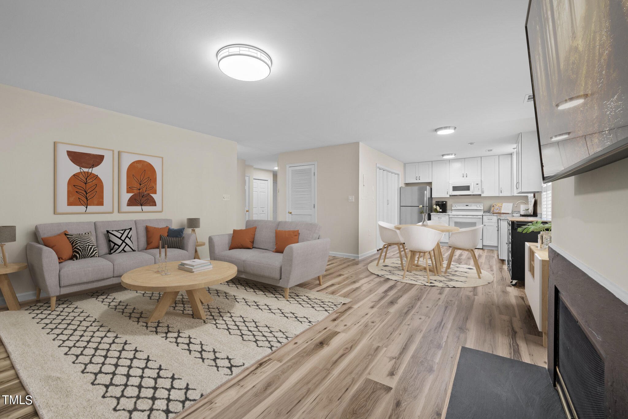 a living room with furniture and a table