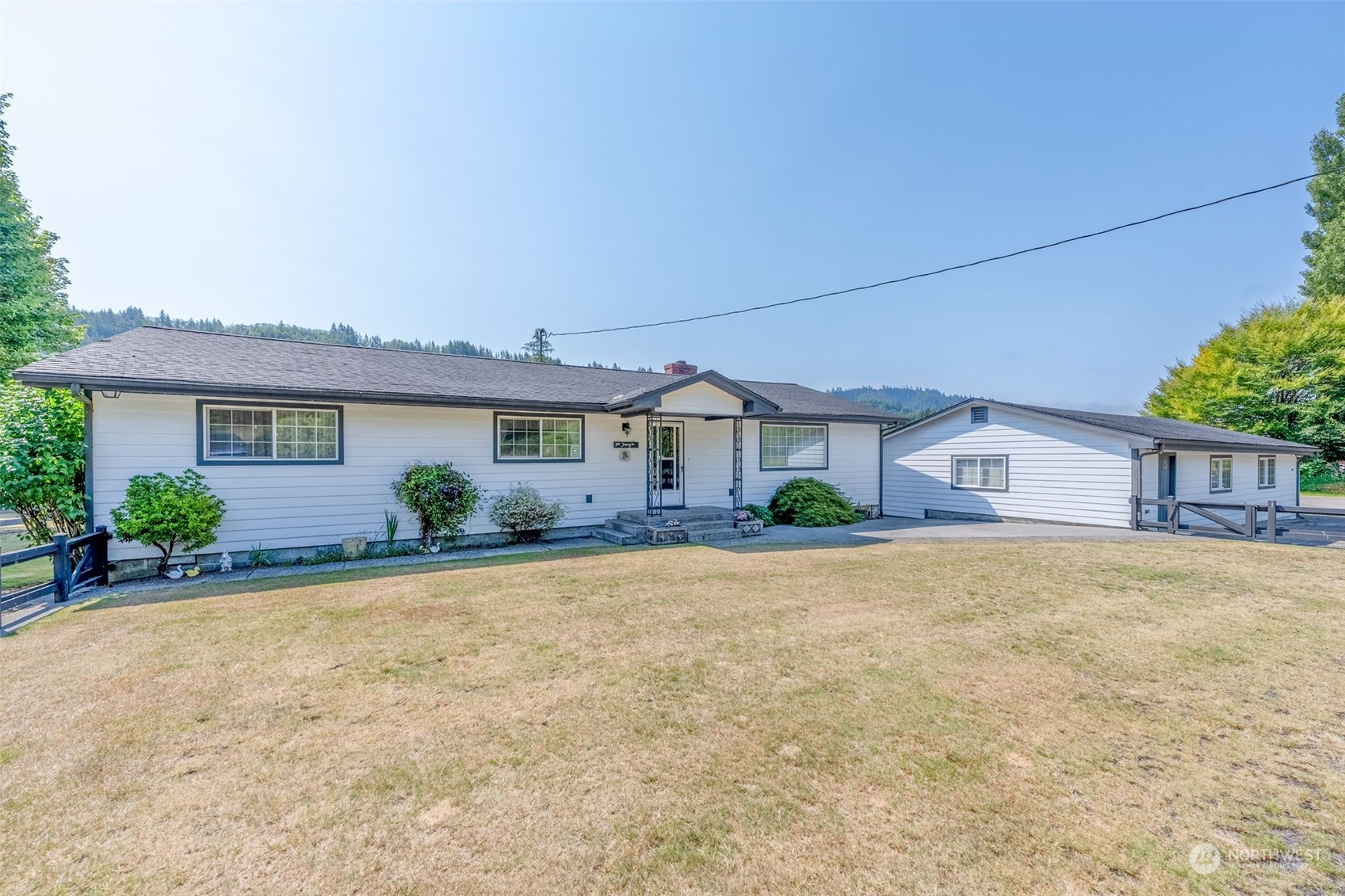 front view of a house with a big yard