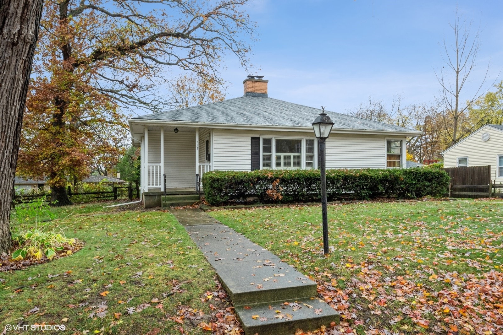 front view of a house with a yard