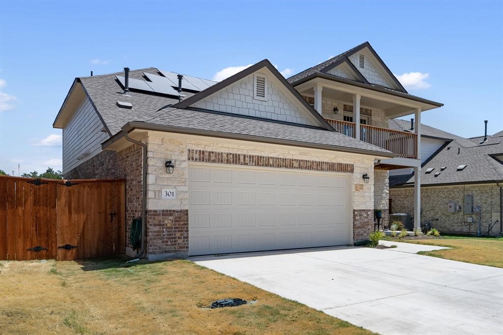 a view of a house with a garage