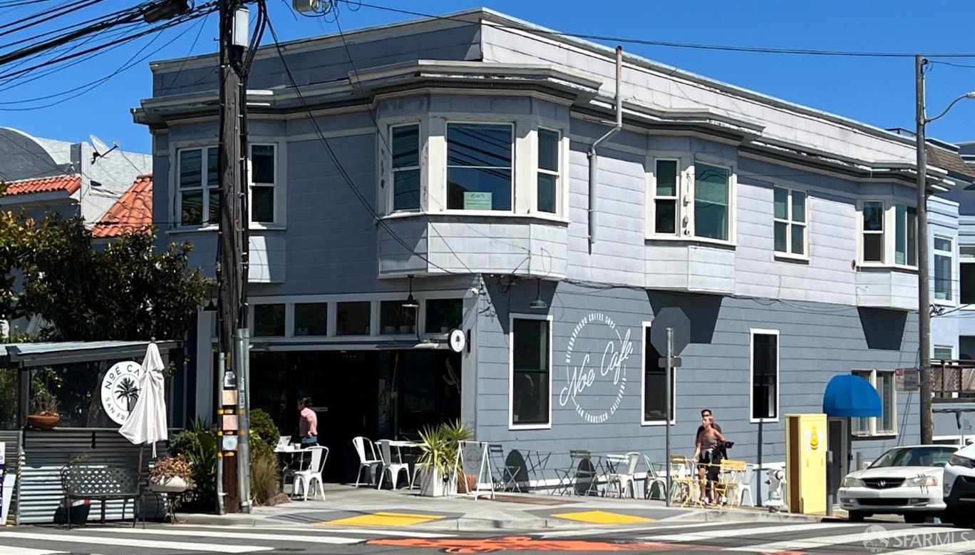 a front view of a building with street view