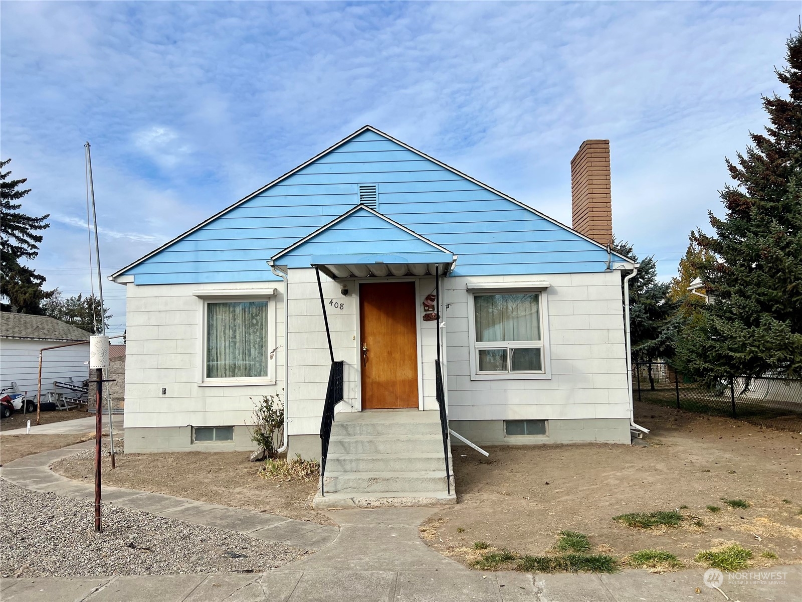 a front view of a house with a garage