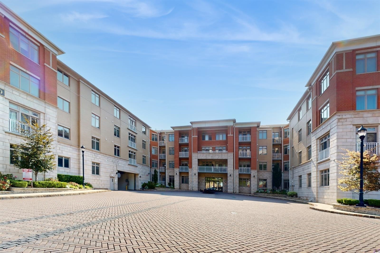 a view of a building with a street