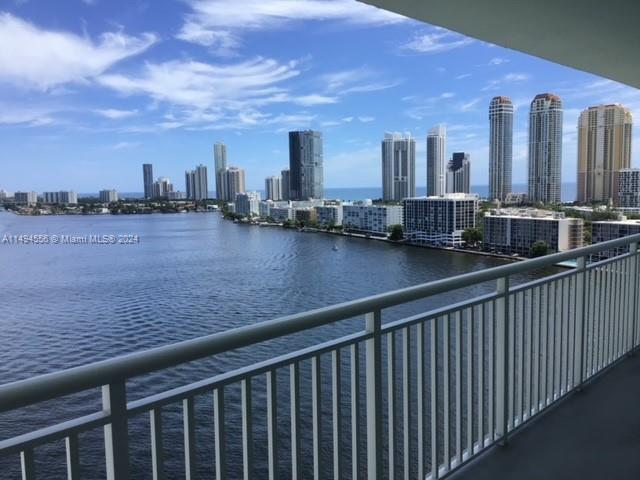 a view of a balcony with city view