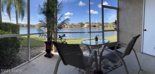 a view of a chairs and table in patio