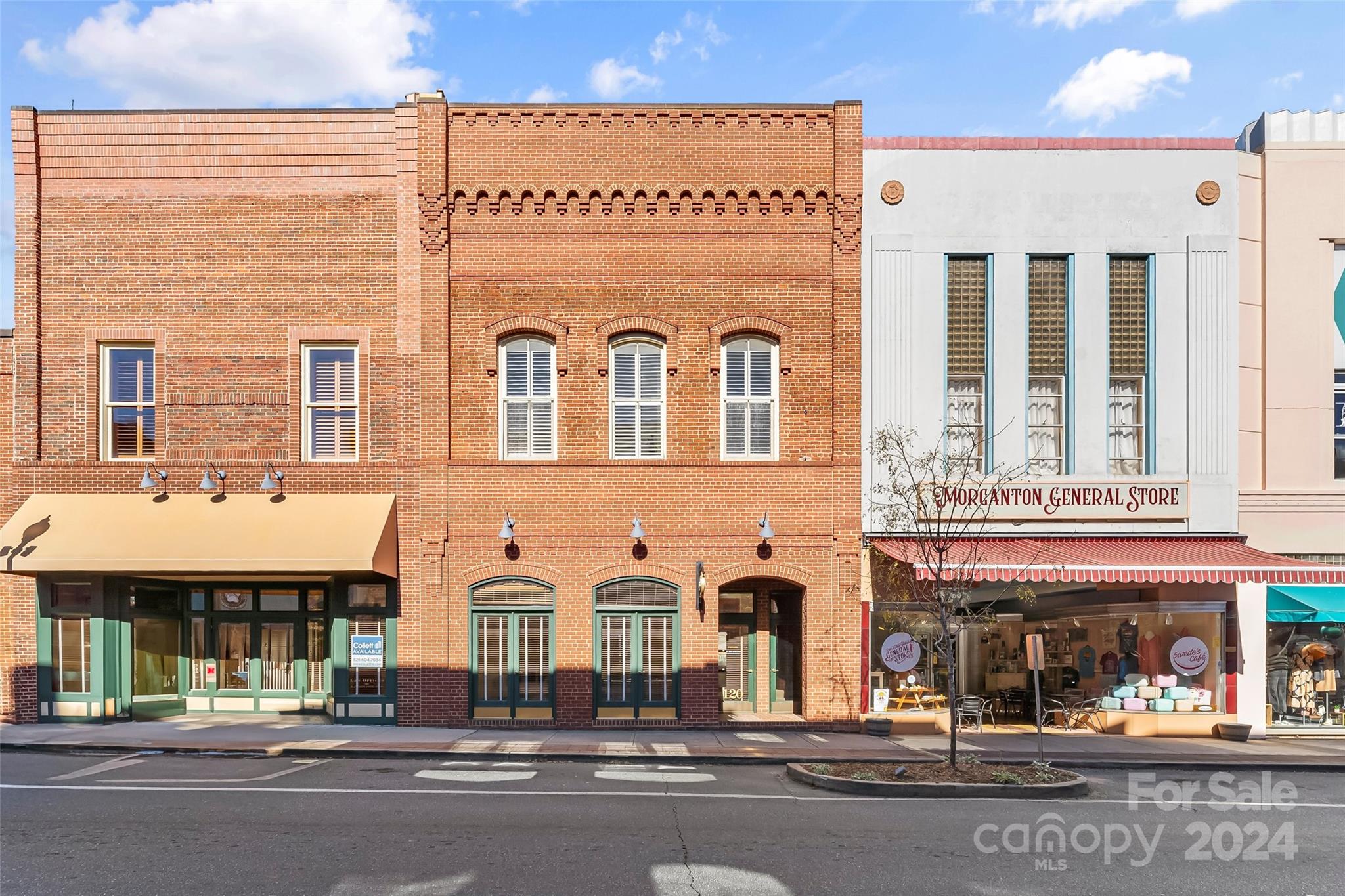 a front view of a building with street