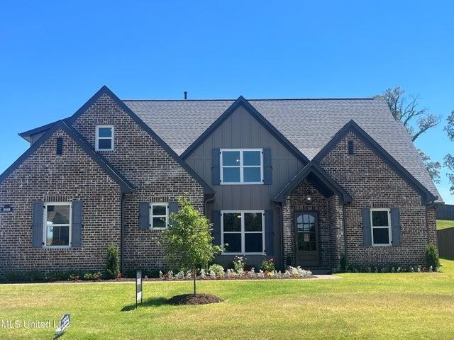 View of front of house with a front lawn