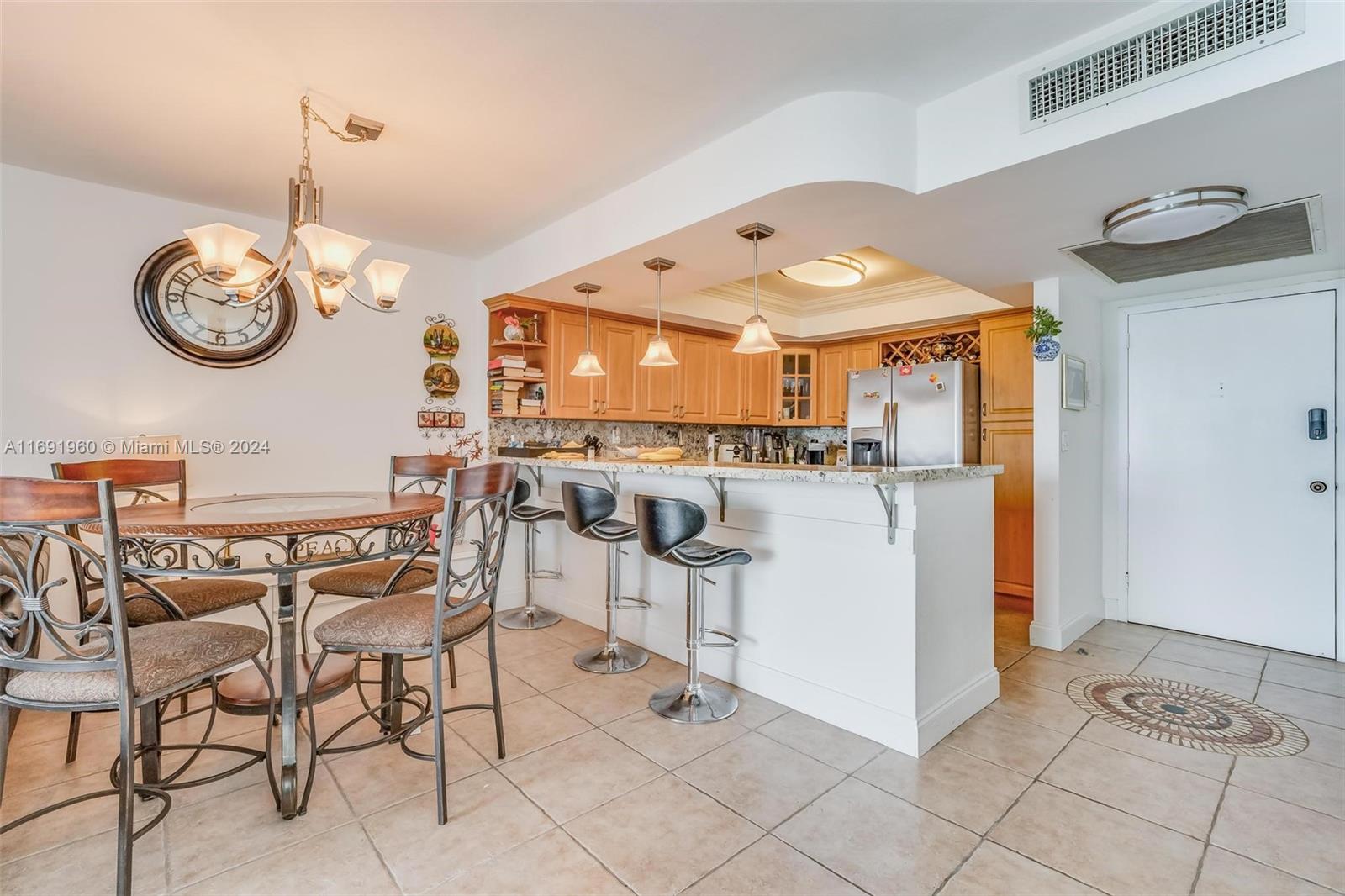 a view of a kitchen and dining room