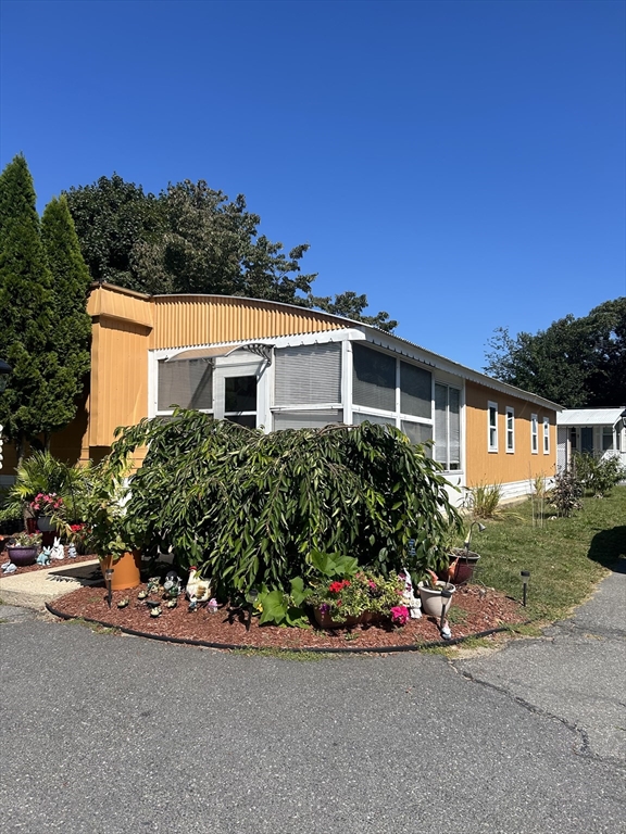 front view of a house with a street