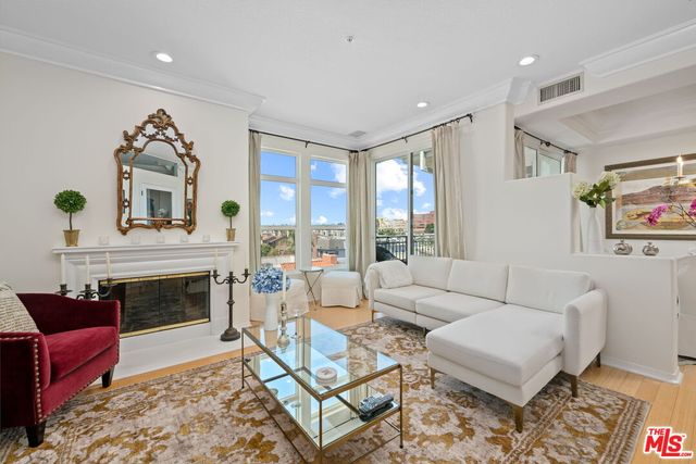 $1,549,000 | 11706 Darlington Avenue, Unit 401 | Brentwood