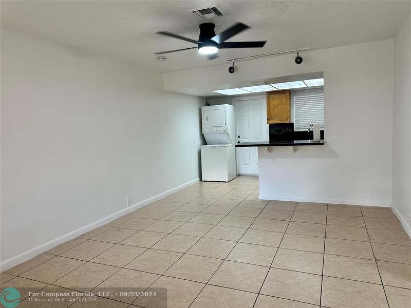 a view of a livingroom with a flat screen tv