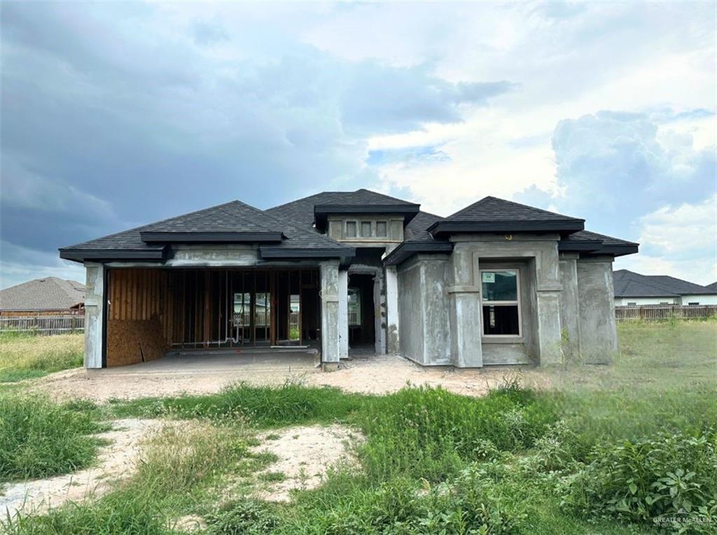 Rear view of house featuring a patio area