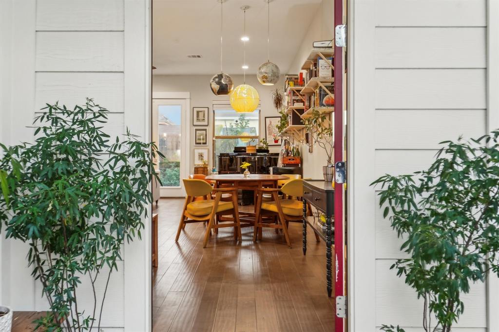 Bright entryway with high ceilings, inviting guests into a warm, open living space