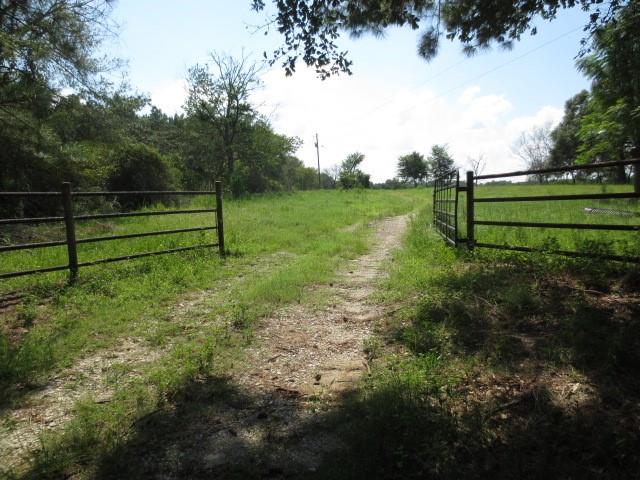 a view of park with fence